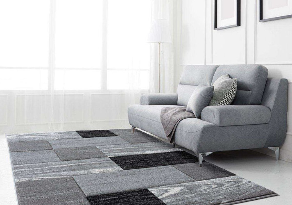 Rug and sofa for Cunninghams Rugs case study